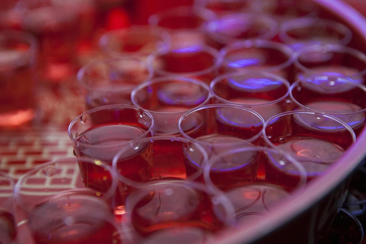 a bunch of wine glasses sitting on a table