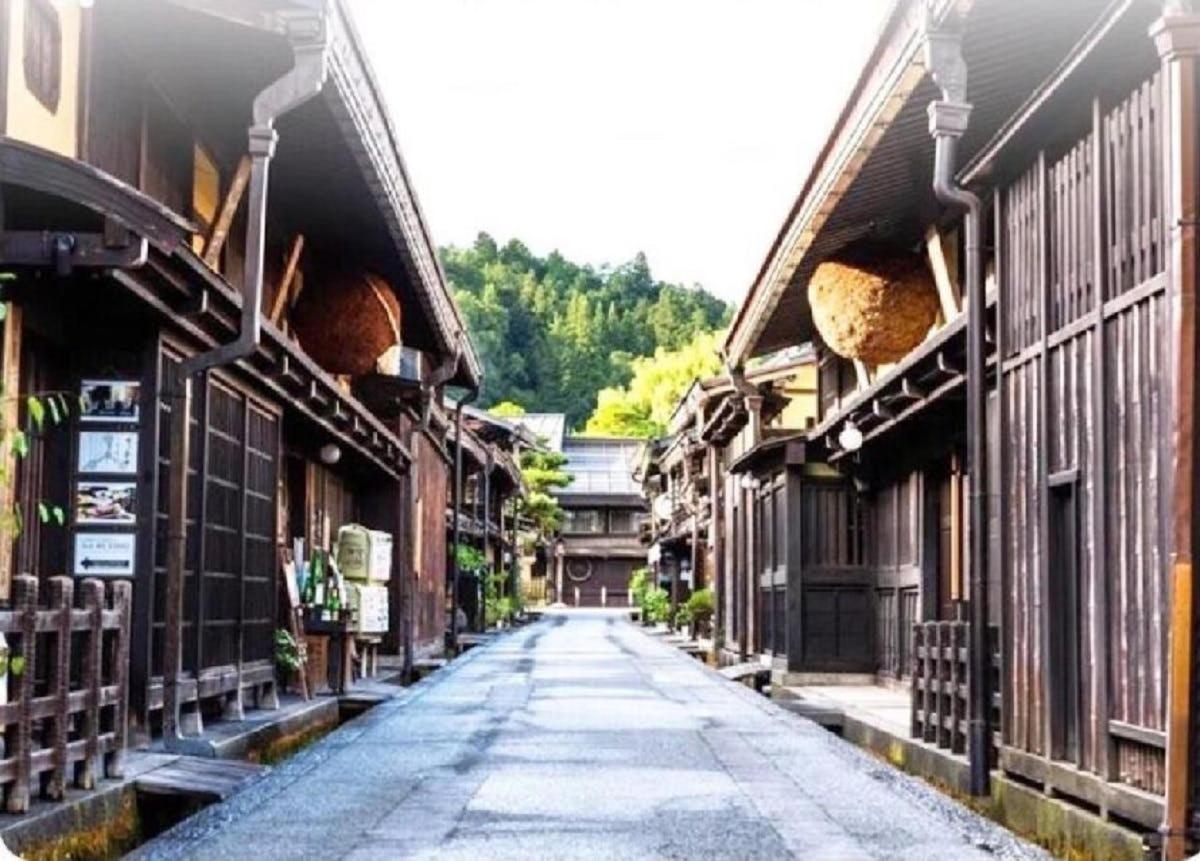 an empty street in an old town with buildings