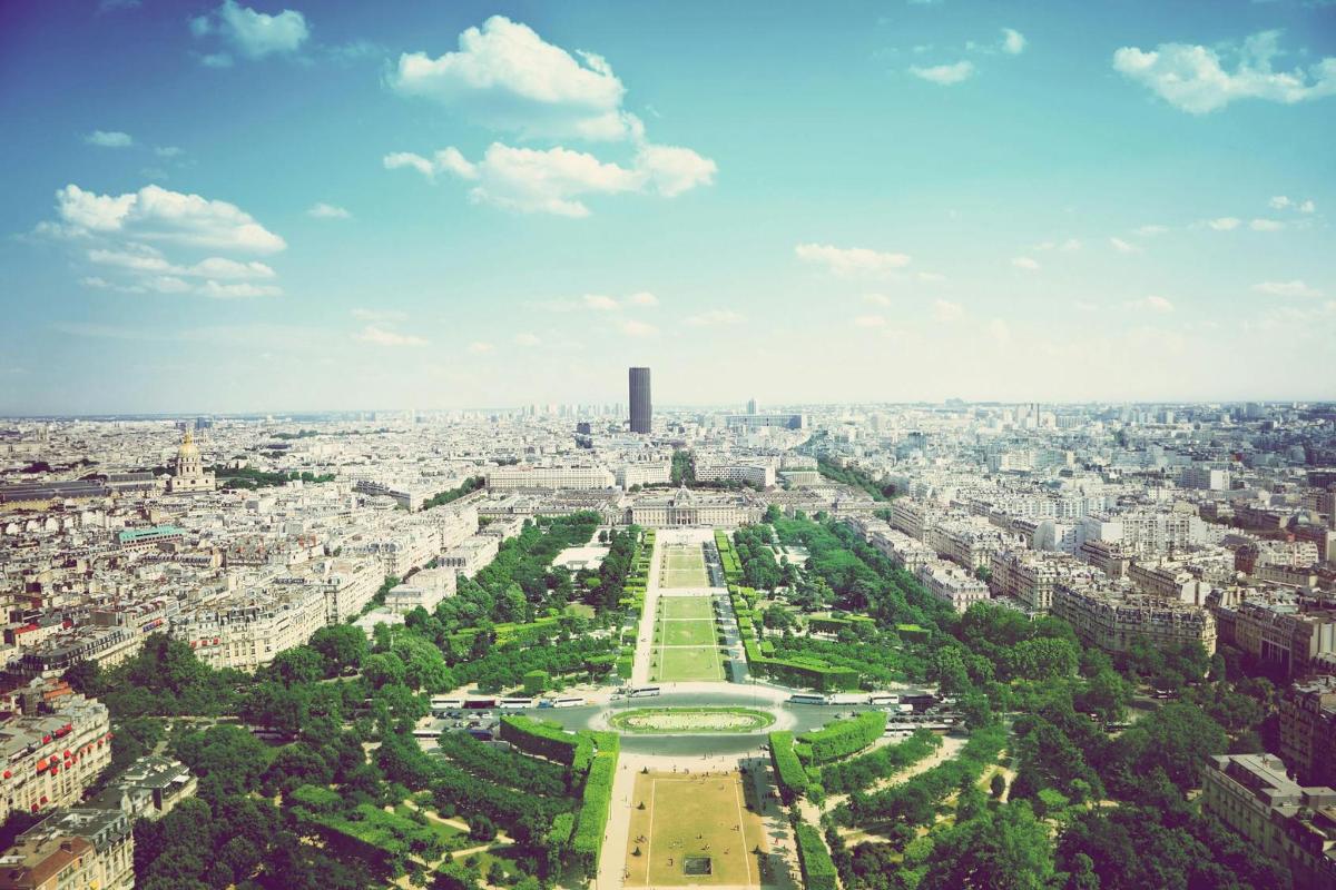 an aerial view of a city with a large city