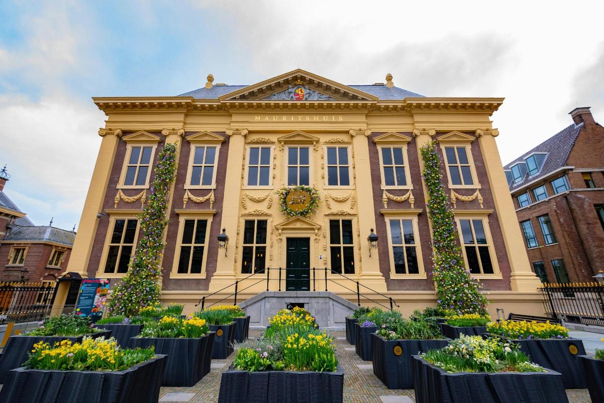 a building with flowers in front of it