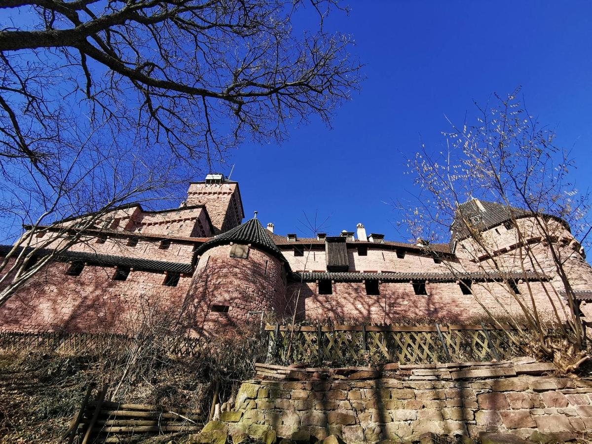 a large castle with some stairs in front of it