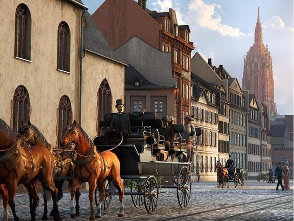 a group of people riding in a horse drawn carriage