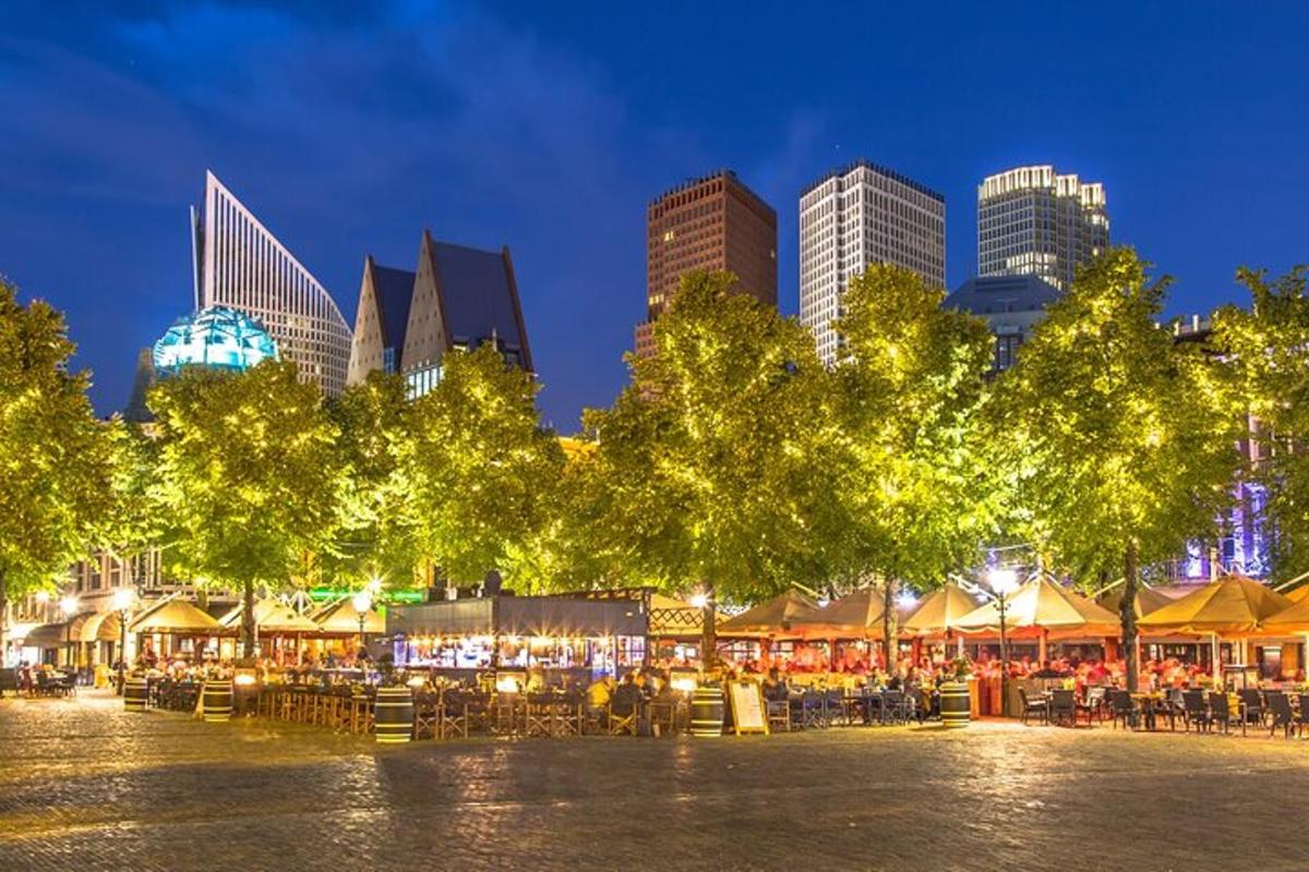 a city skyline at night with tables and buildings