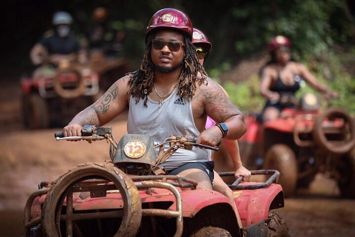 a man is riding on a toyota off road vehicle