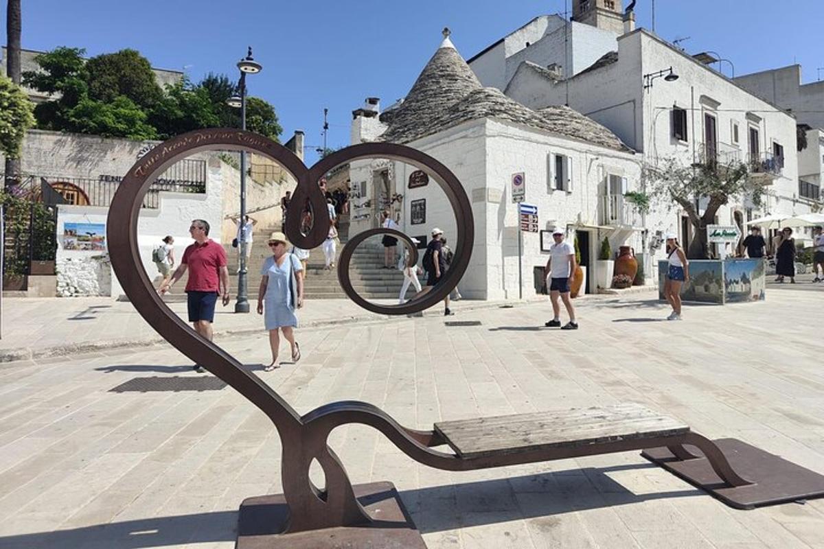 a sculpture of a pair of hearts on a street