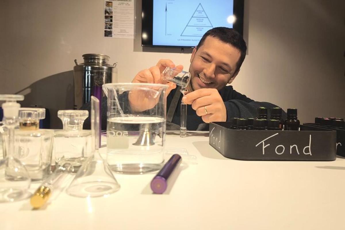 a man sitting at a table taking a picture with a camera