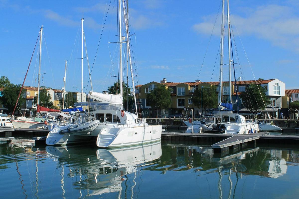 a group of boats docked in a harbor
