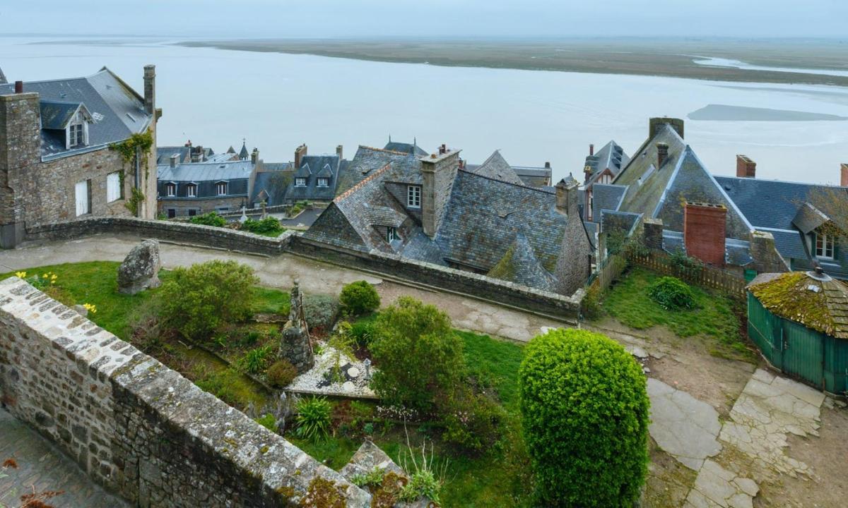 an aerial view of a city with houses