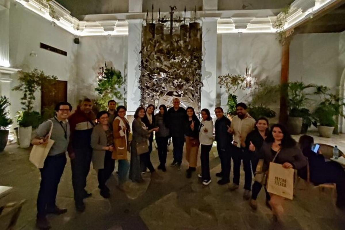 a group of people posing for a picture in a room