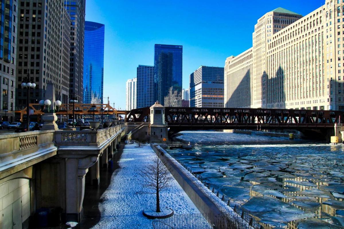 a bridge over a river in a city