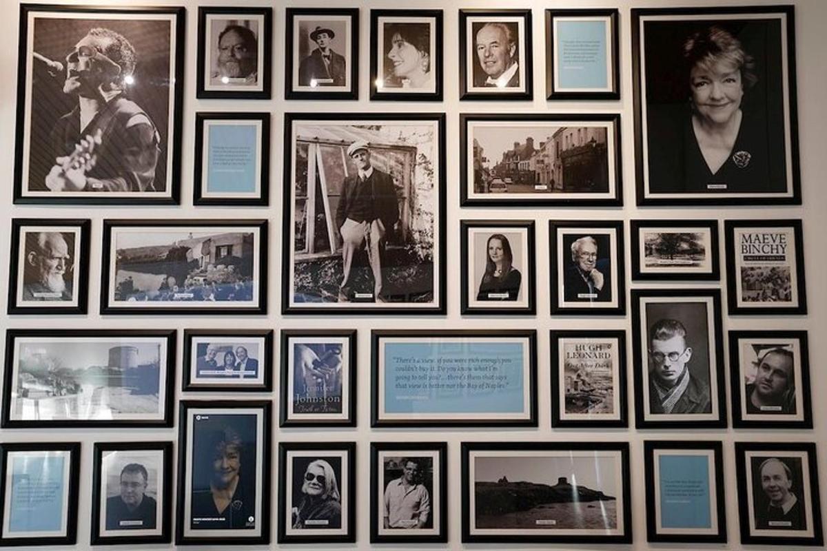 a bunch of pictures hanging on a wall