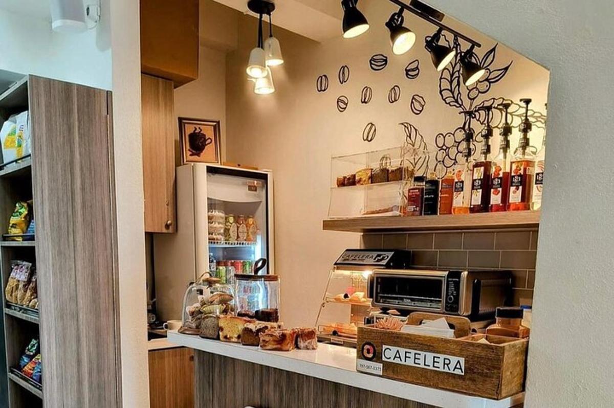 a bakery with a counter with a microwave