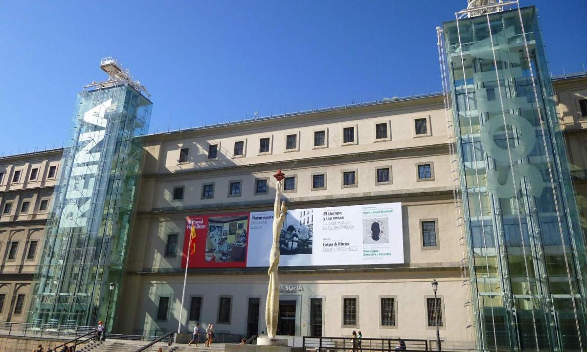 a large building with a sign in front of it