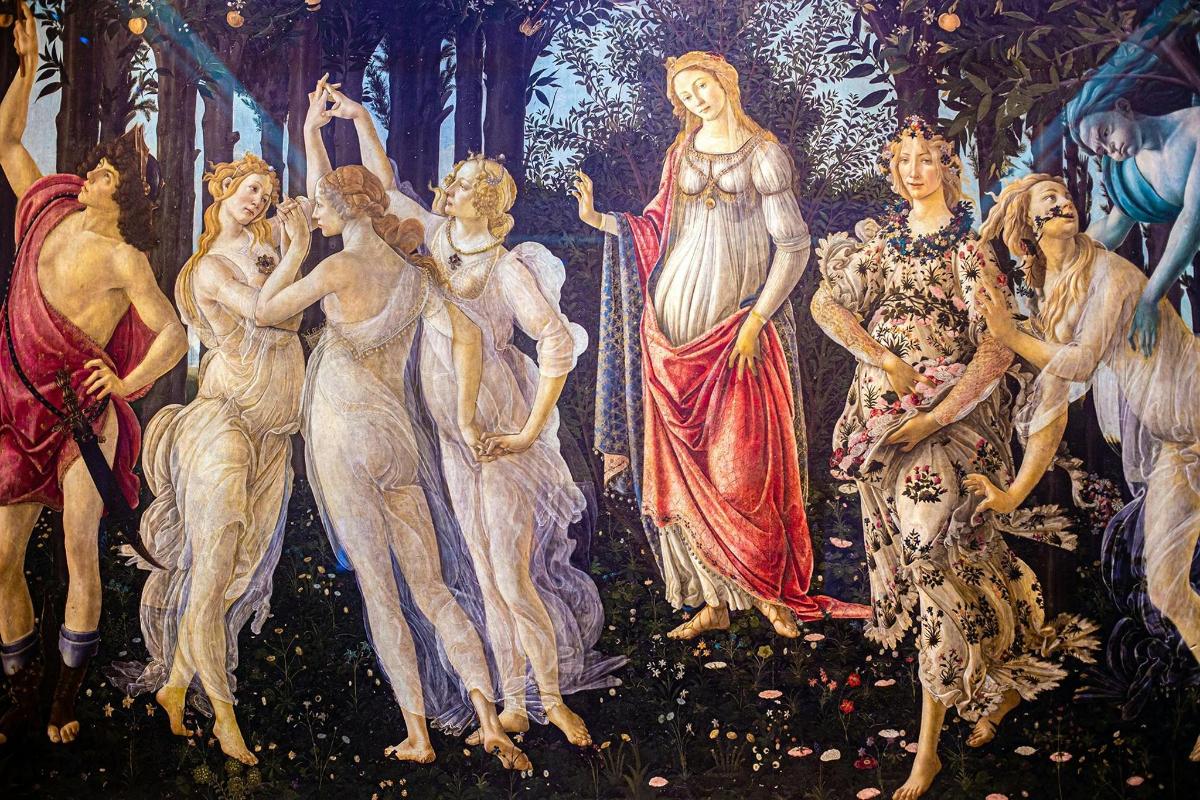 un dipinto di un gruppo di donne su un muro