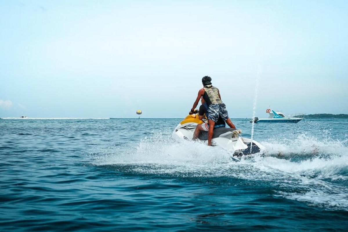 a man on a jet ski in the water