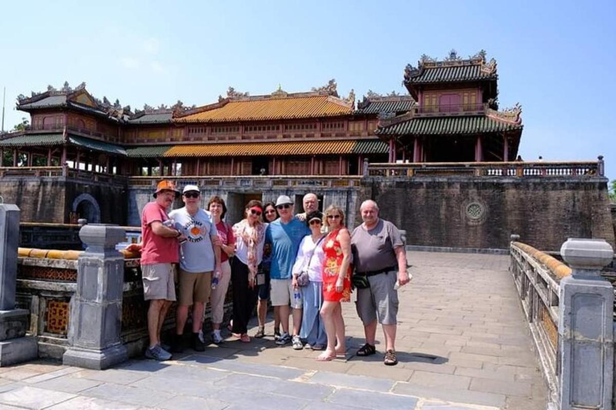 a group of people standing on a bridge