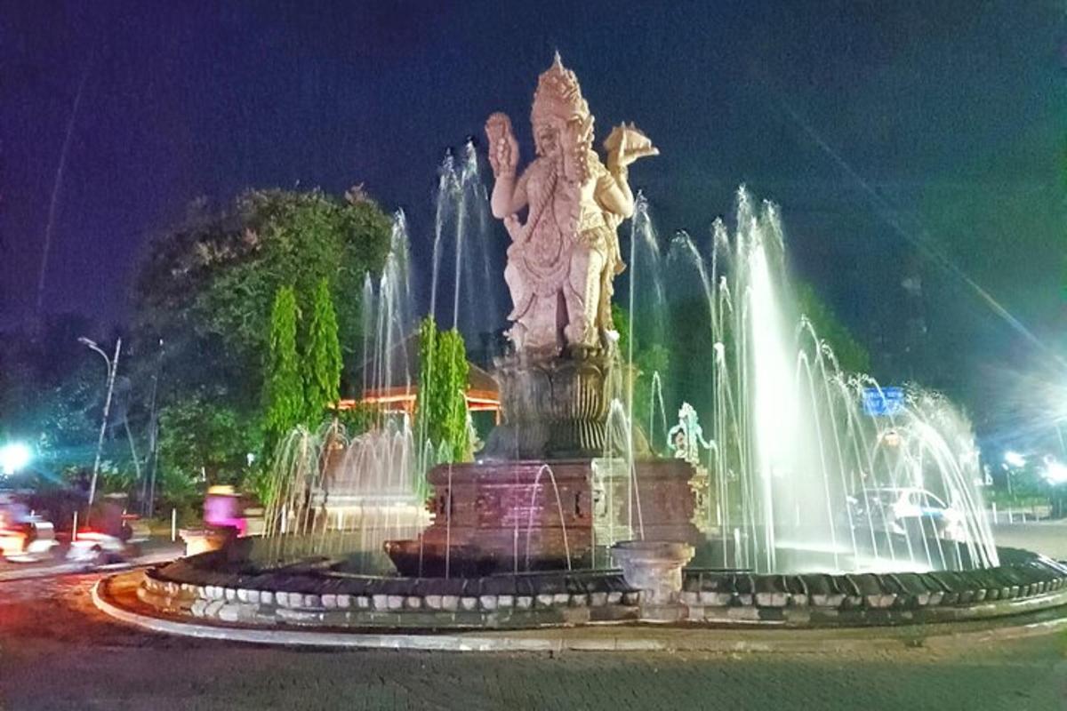 pancutan air dengan patung di tengah