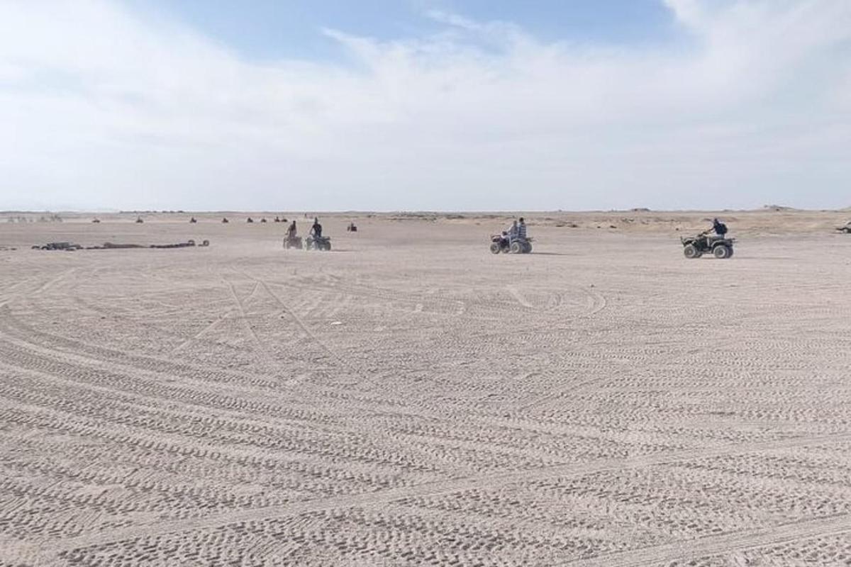 a group of people riding motorcycles in the desert