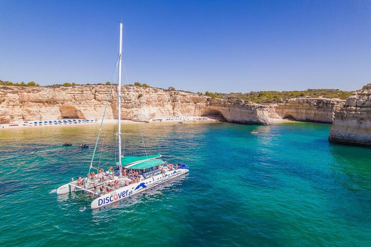 a group of people on a boat in the water