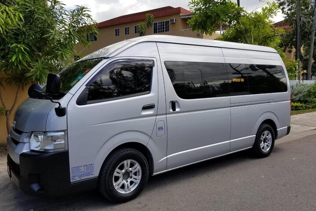 a white van parked on the side of a street