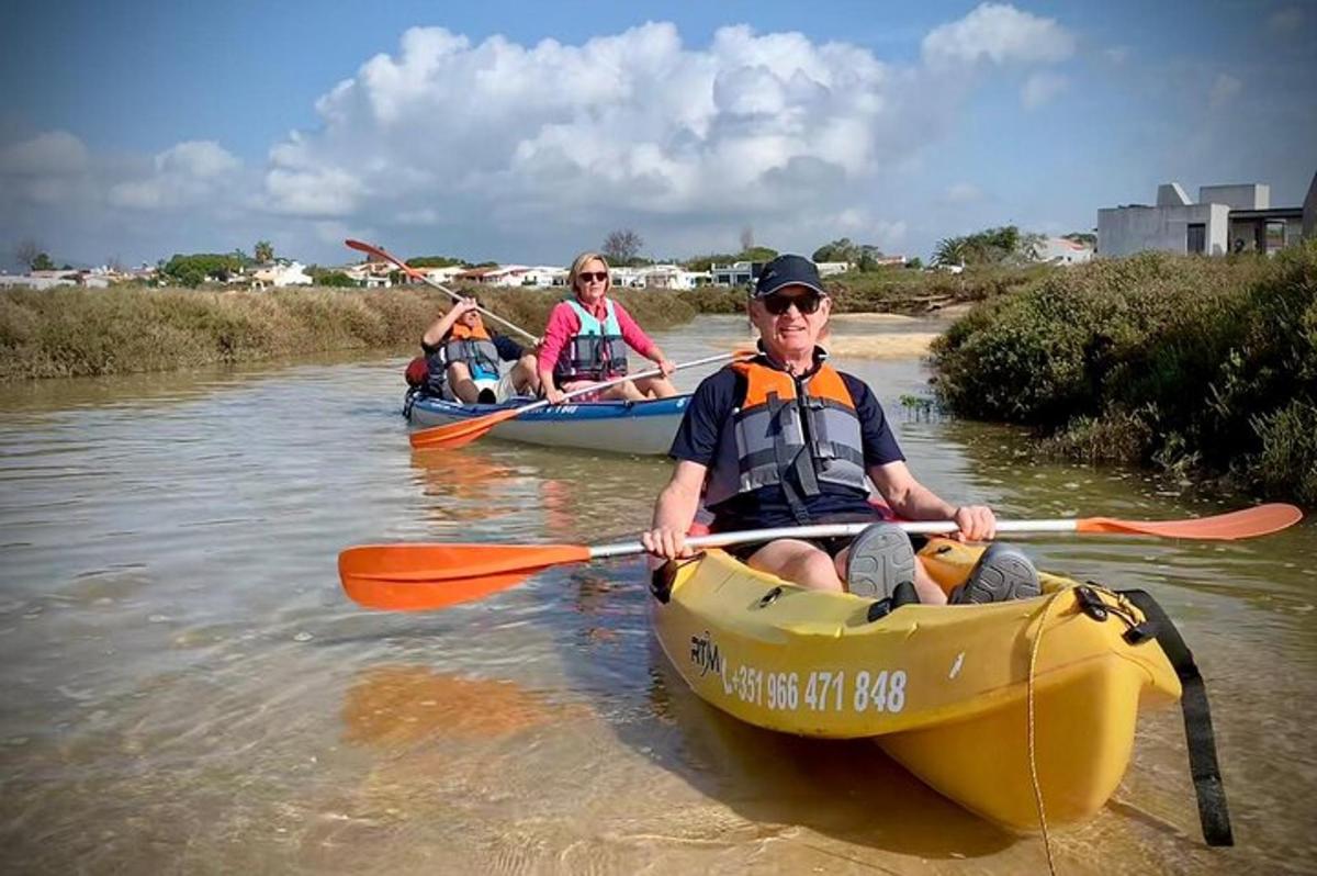 a group of people kayaking on a river