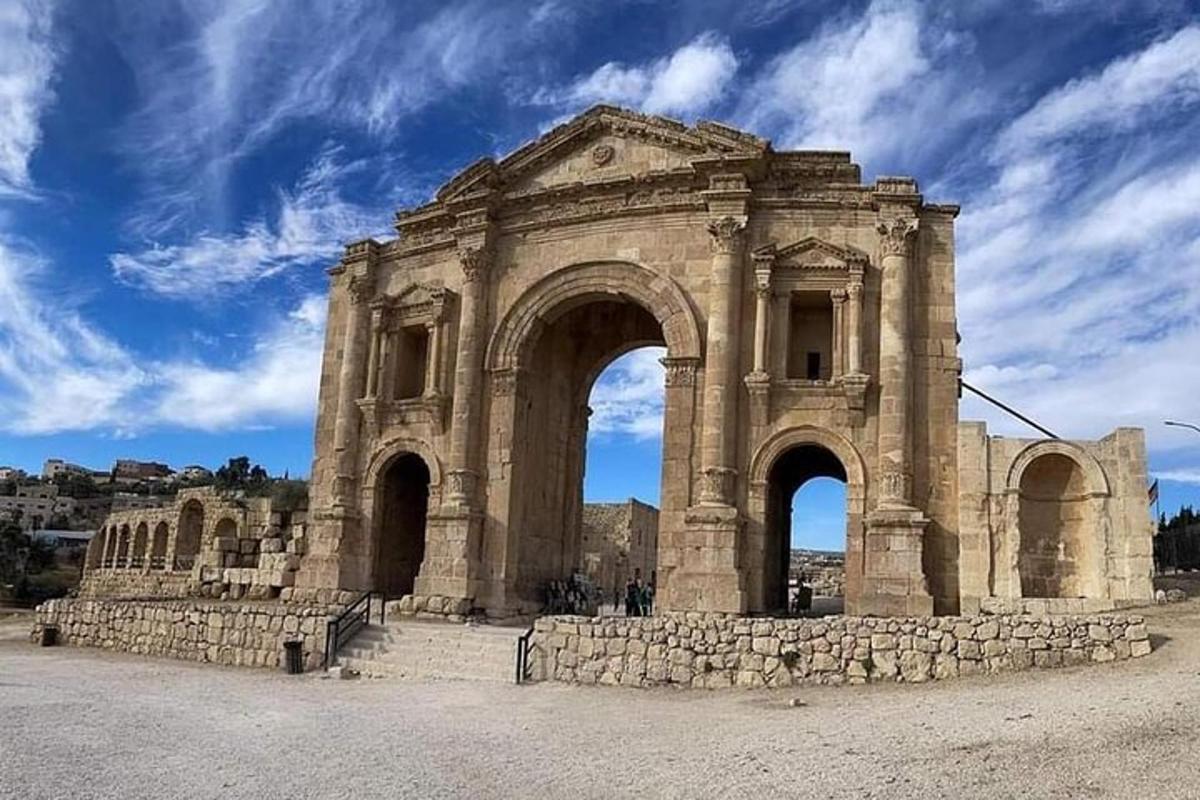 a large stone building with two arches on thevisor