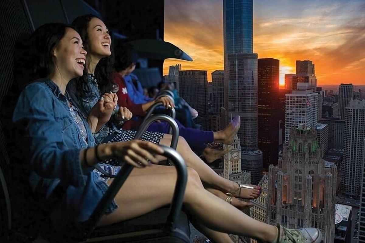 a group of people sitting on top of a building