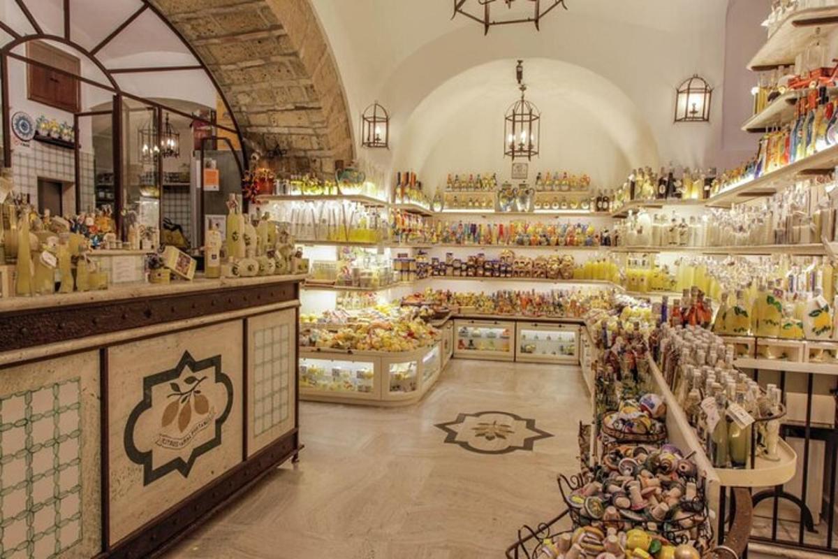 a store filled with lots of vases on display
