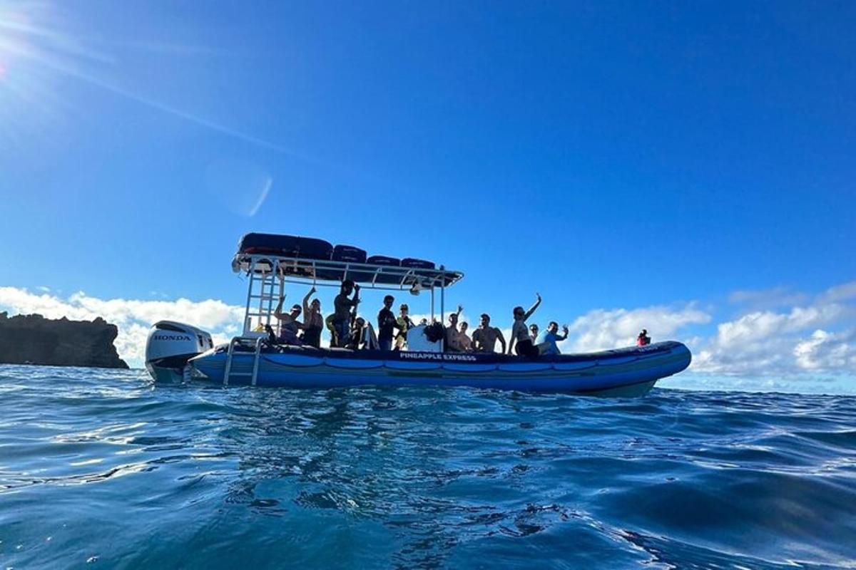 a group of people on a boat in the water
