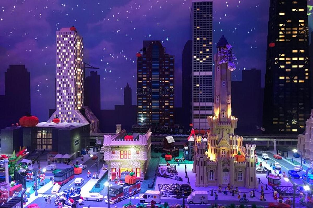 a view of a city at night with buildings