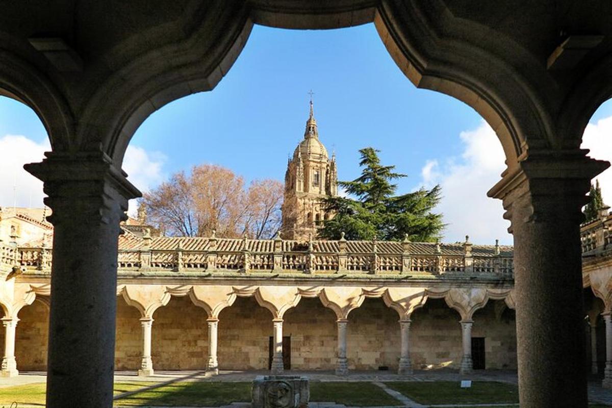 a view of a building with a clock tower in the background