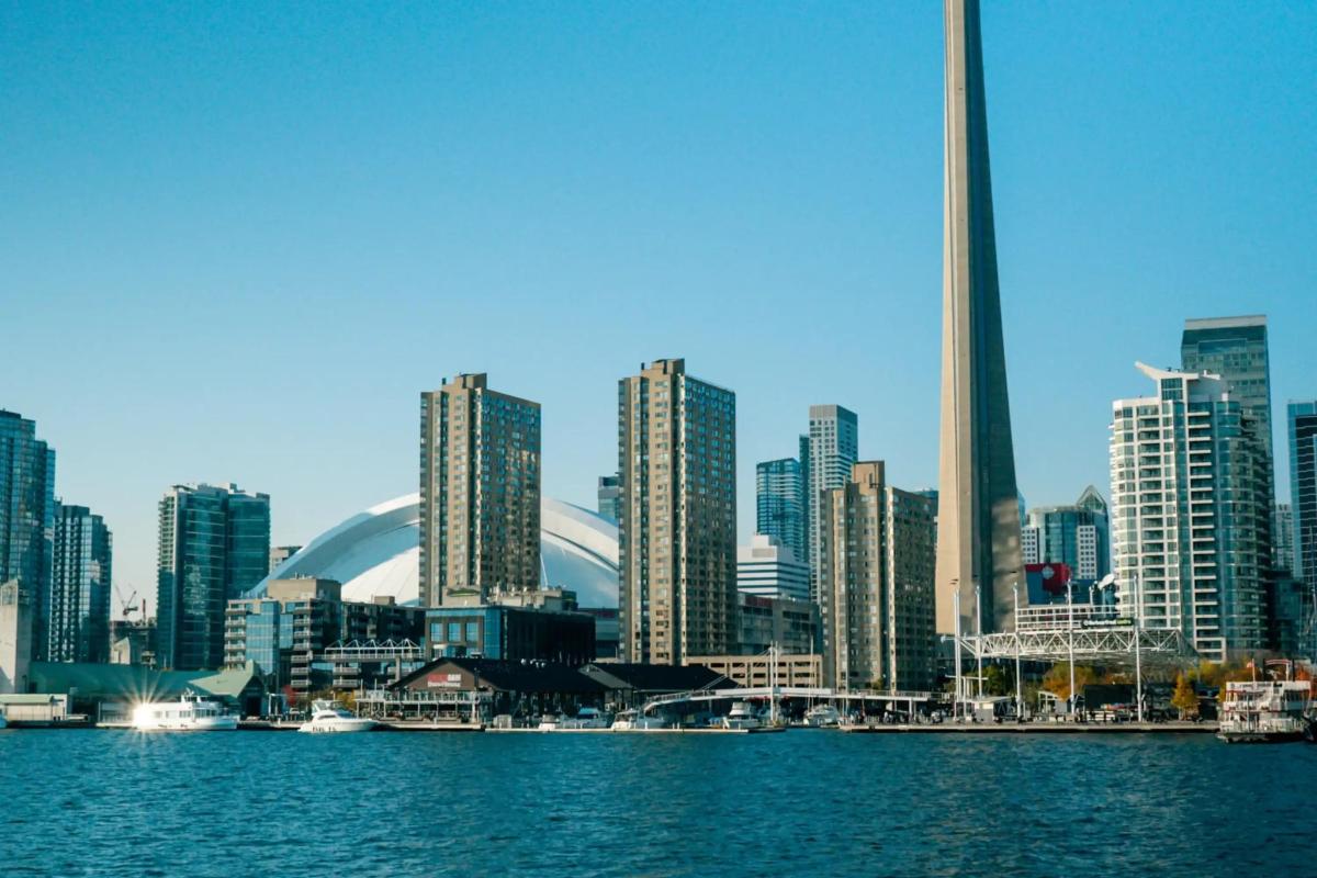 a view of a city with a river and buildings