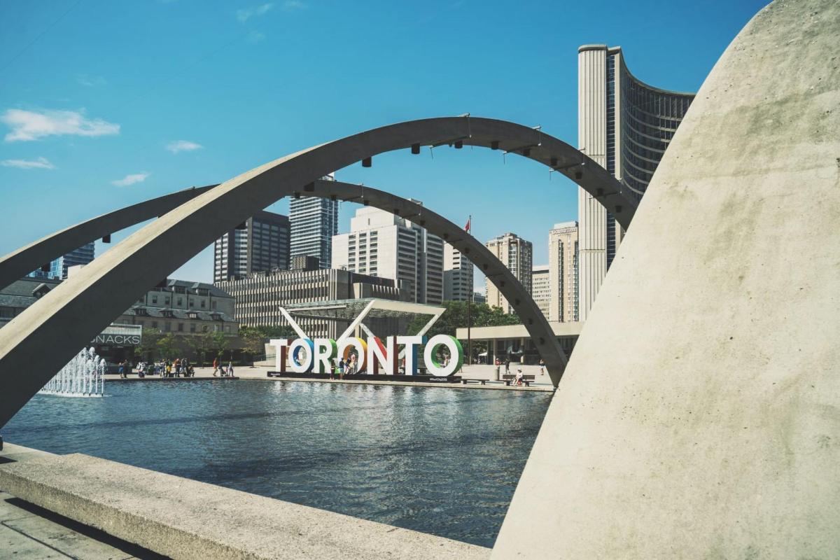 a bridge over a body of water in a city