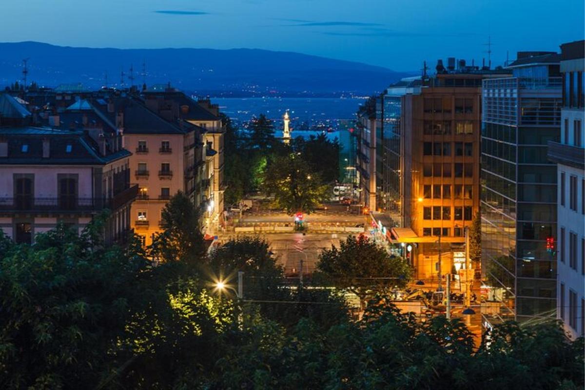 a view of a city at night with buildings