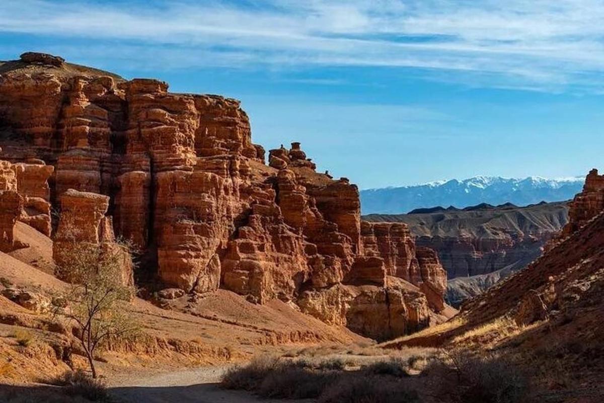 a view of a canyon with rocks and mountains