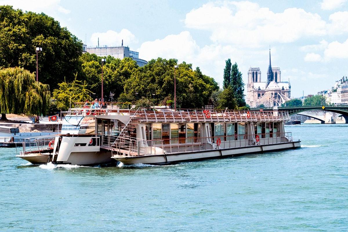 a ferry boat on the water on a river