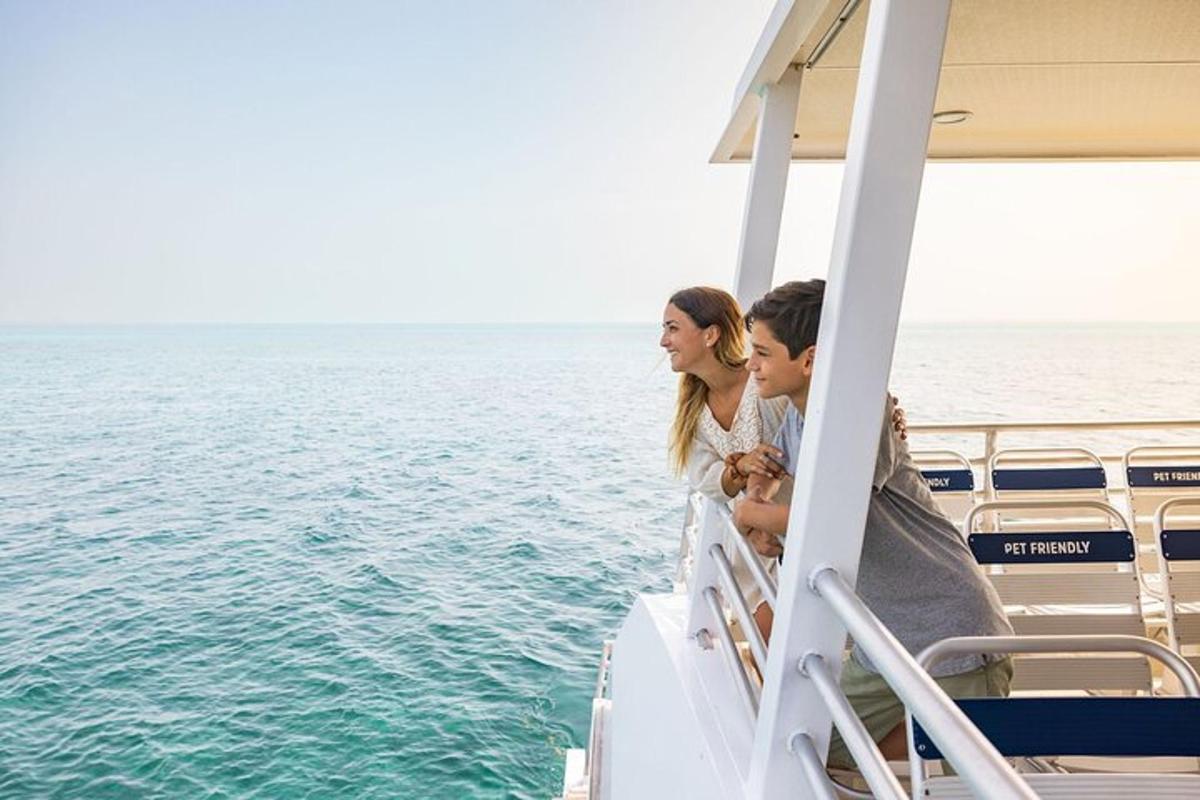 a group of people on a boat in the water