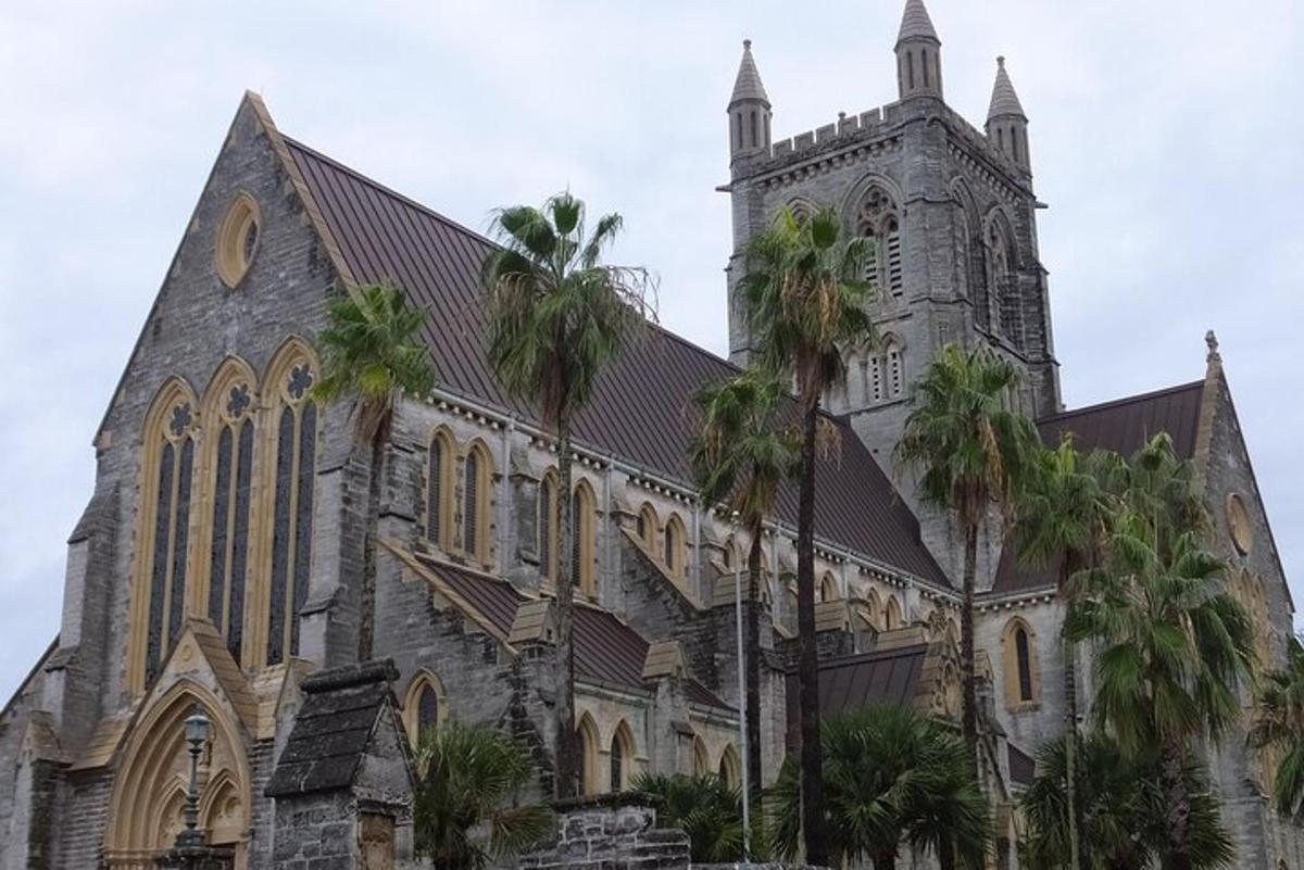 a church with palm trees in front of it