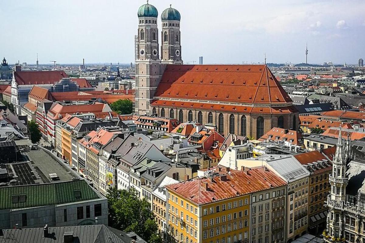 an aerial view of a city with a clock tower