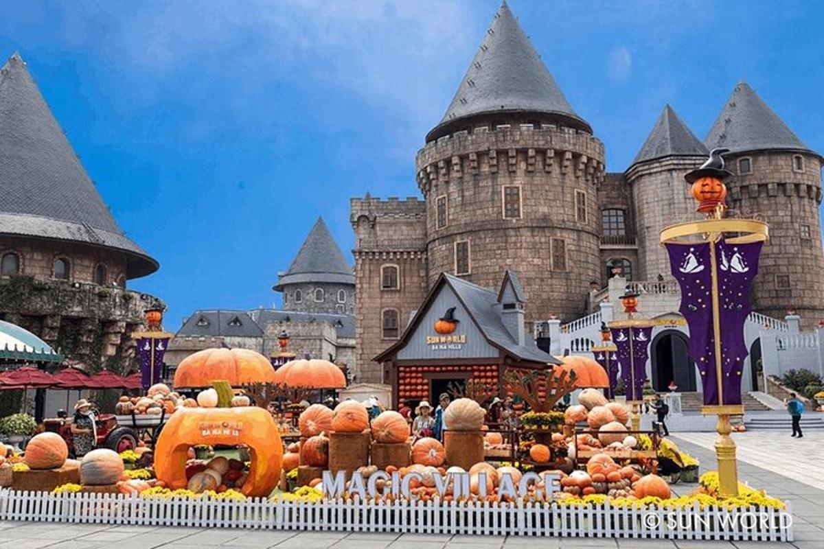 a display of pumpkins in front of a castle