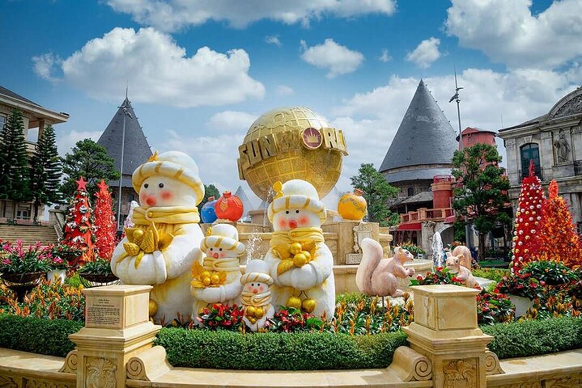 a display of figurines of snowmen in a garden