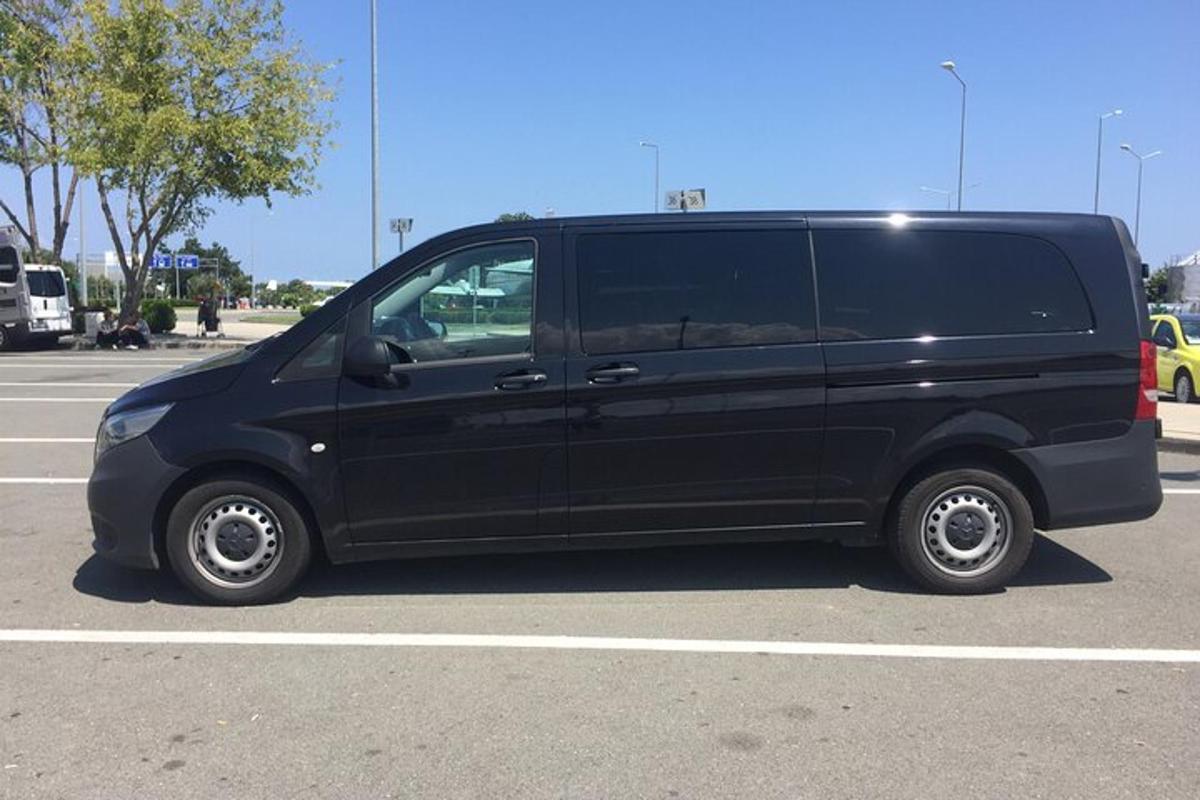 a black van parked in a parking lot