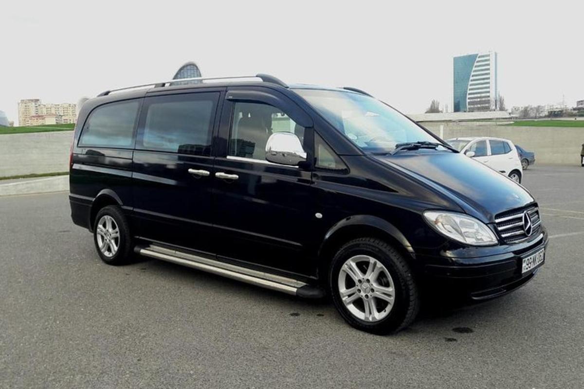a black van parked in a parking lot