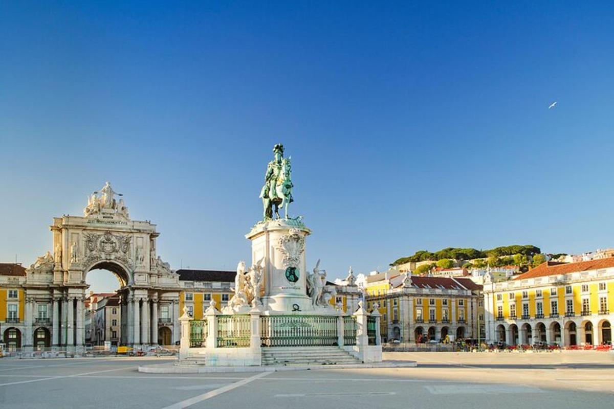 a building with a statue in the middle of a street
