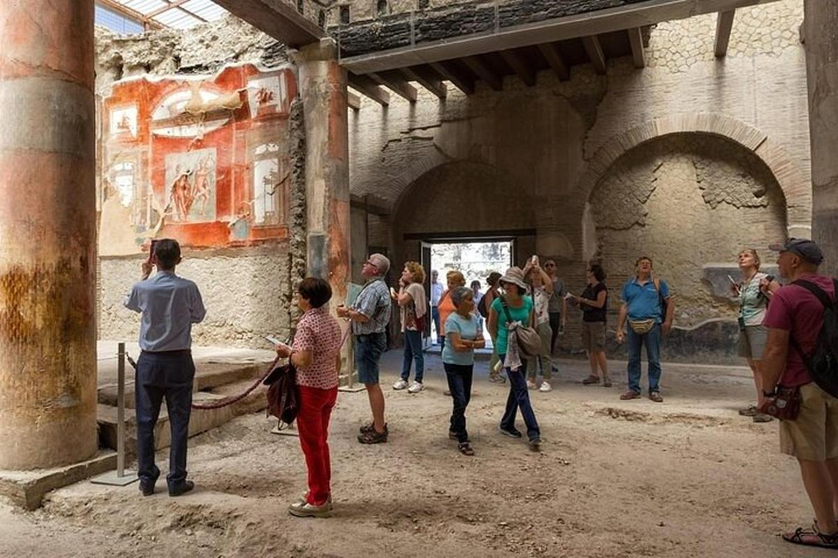 a group of people standing inside of a building