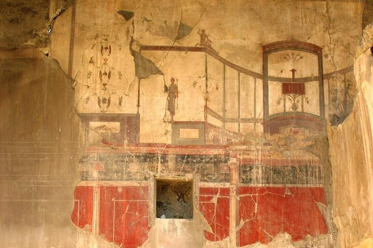a painting on the wall of a room in a cave