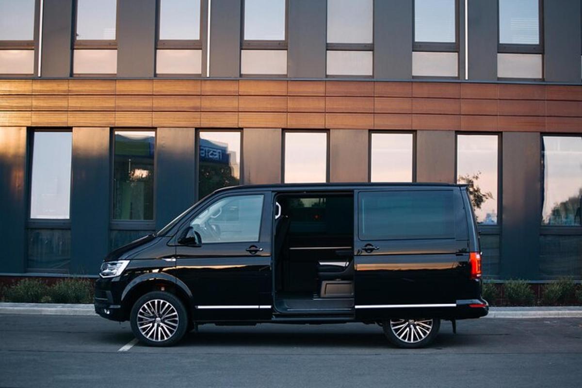 a black van parked in front of a building