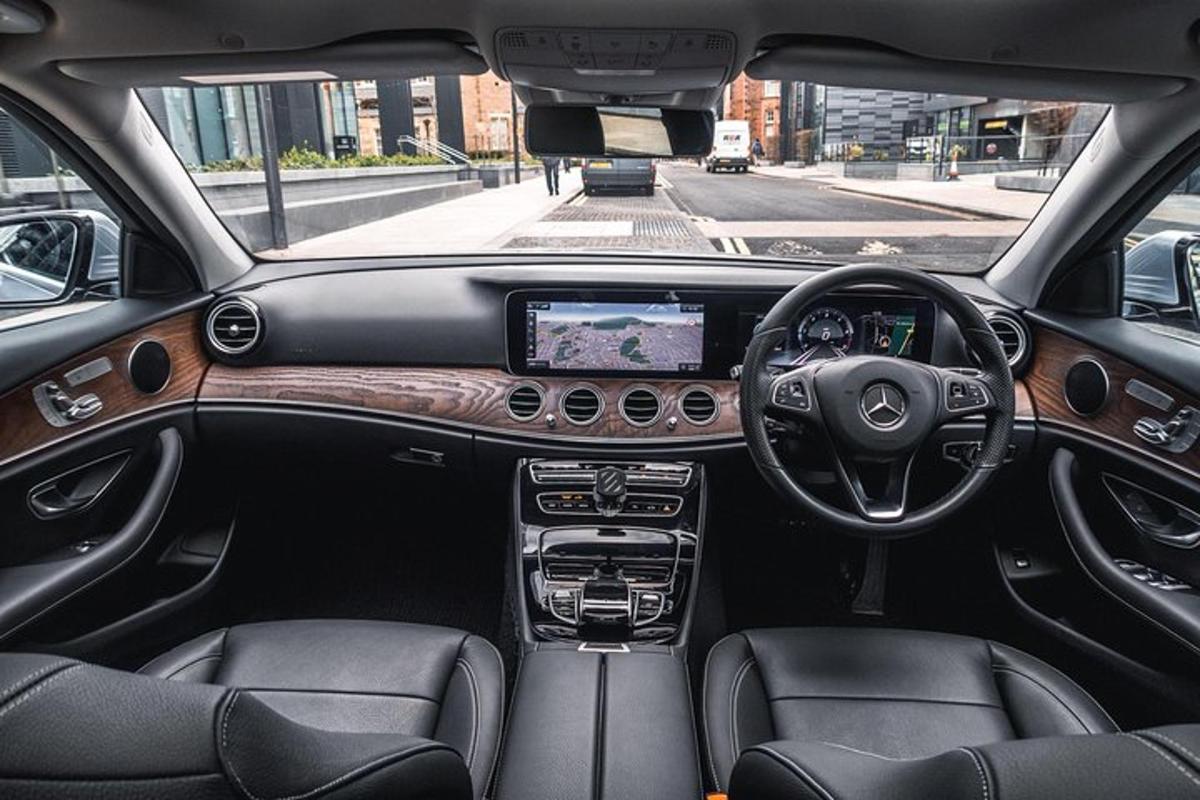 a view of the dashboard of acedes benz car