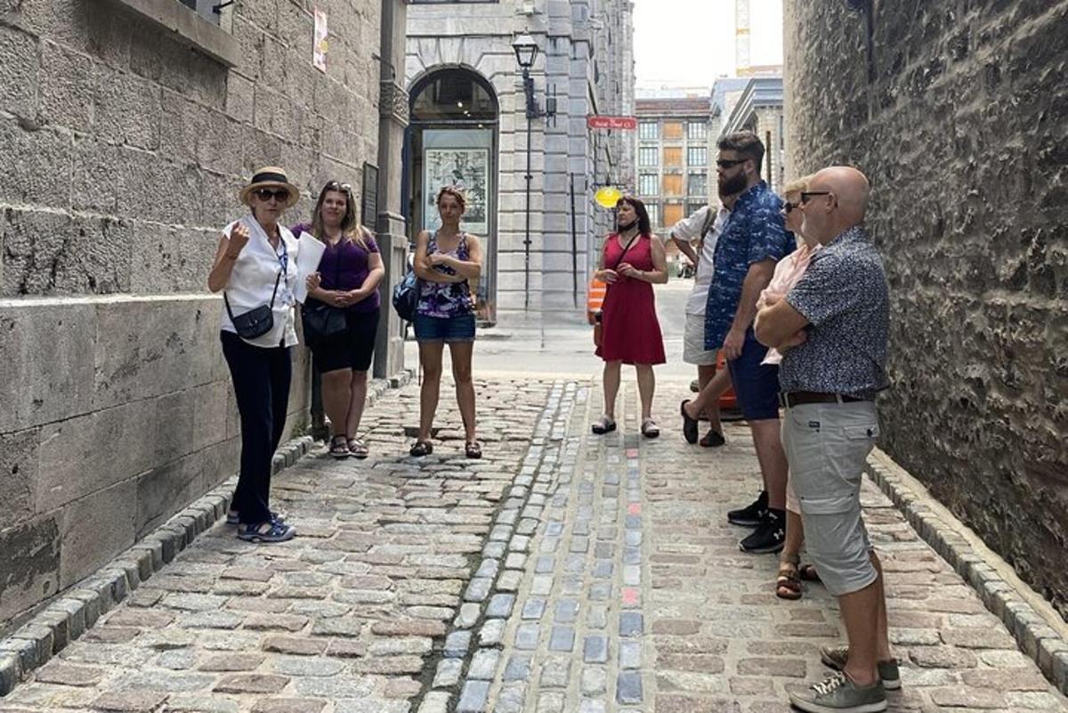 a group of people standing in an alley