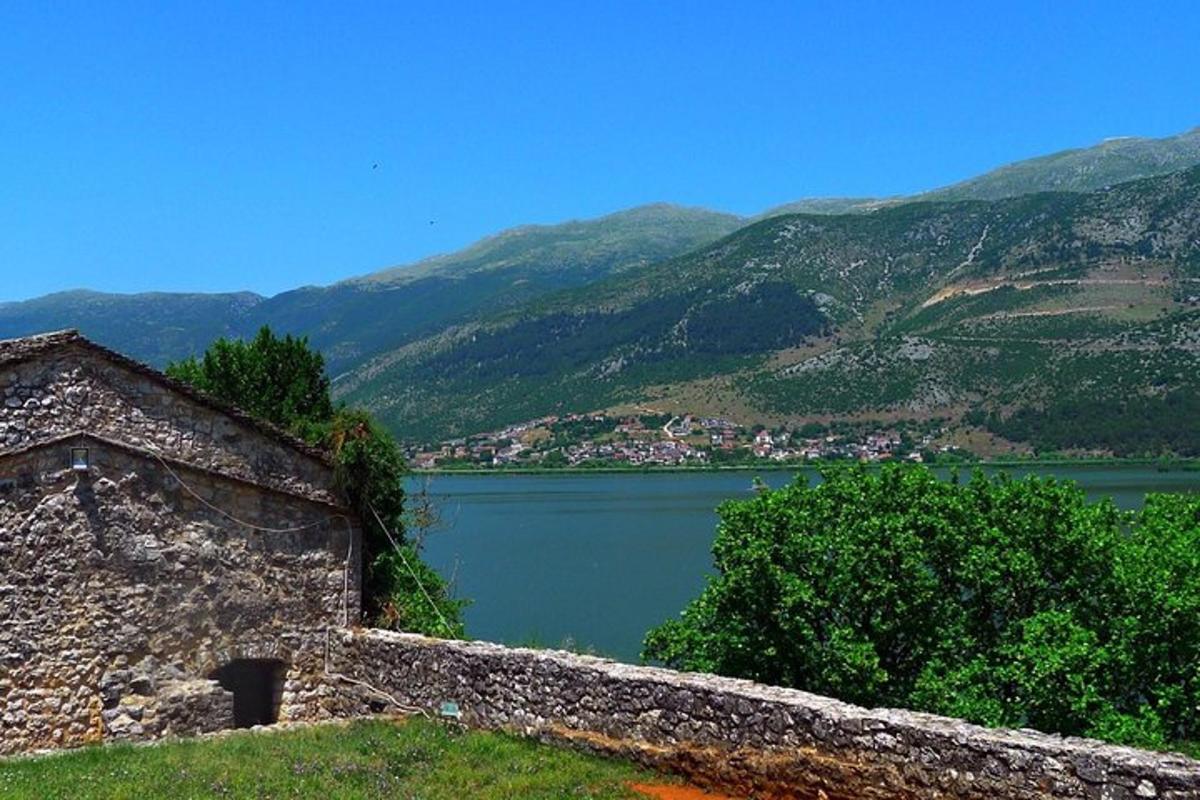 a view of a lake with mountains in the background